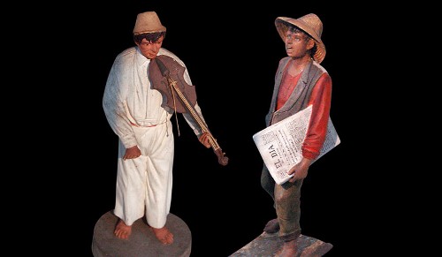 Imagen de Figura de hombres con violín y periódico (propio)